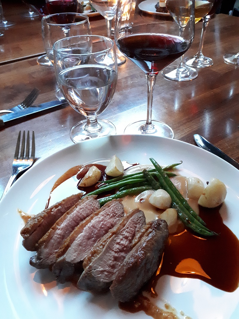 Duck served with wine at 10 Acres Bistro and Bar. Photo Sabrina Pirillo